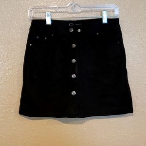 Super cute, snap-front, black miniskirt.